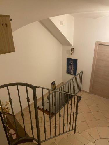 a spiral staircase in a home with a stair case at C'era una volta in Anagni
