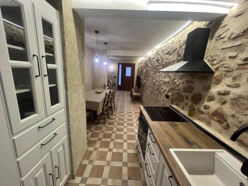 Kuchyň nebo kuchyňský kout v ubytování Casa Raquel Montanejos