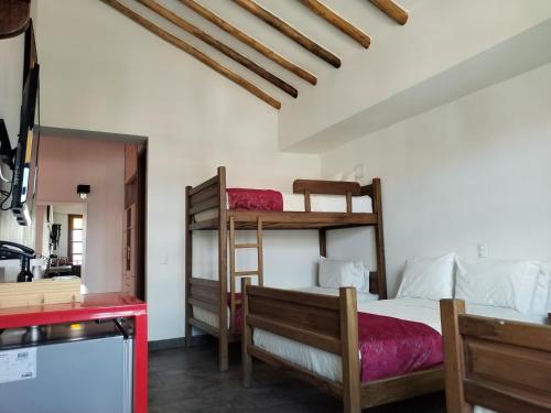 Ένα ή περισσότερα κρεβάτια σε δωμάτιο στο Hotel Capitan Ricaurte
