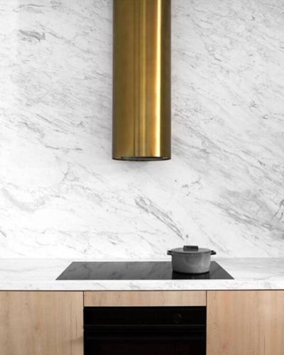 a kitchen counter with a pot on top of it at Luxurious Family Retreat in Blackburn