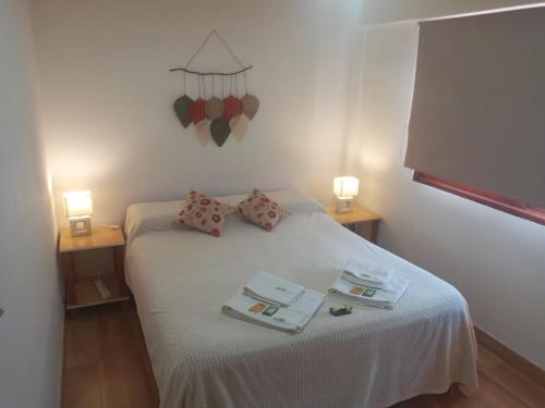 Postel nebo postele na pokoji v ubytování Accueillant Auberge Salta