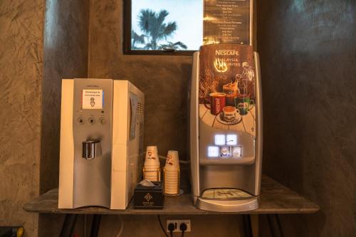 Η κουζίνα ή μικρή κουζίνα στο DJ Citi Plaza Hotel & Suites