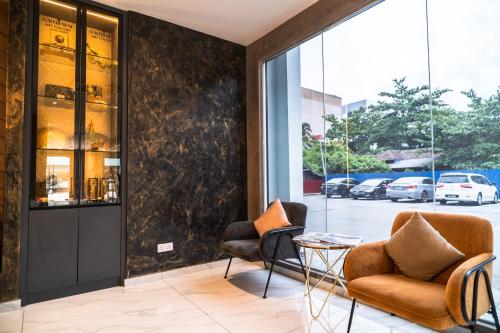 Χώρος καθιστικού στο DJ Citi Plaza Hotel & Suites