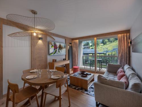 Area soggiorno di Magnifique appt au cœur de Courchevel avec accès bien-être - FR-1-562-81