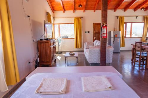 Postel nebo postele na pokoji v ubytování Cabaña Puertas del Cielo