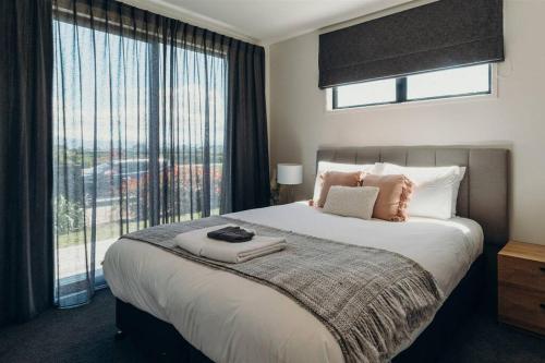 Postel nebo postele na pokoji v ubytování Pool & Tennis Court - Pinot Grove