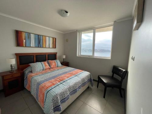 Giường trong phòng chung tại Apartamento Primera Linea de Playa - Vistas Increibles