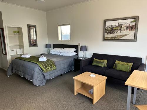 Postel nebo postele na pokoji v ubytování Anderson Park Motel