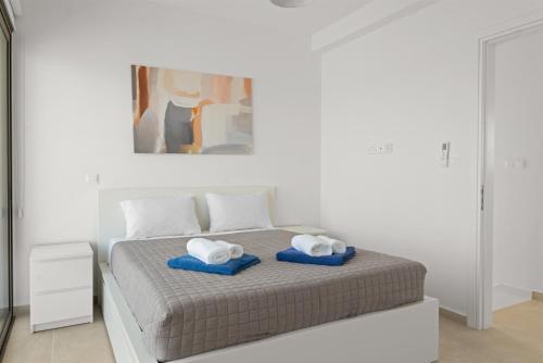 Postel nebo postele na pokoji v ubytování Serenity Waves Villa 26