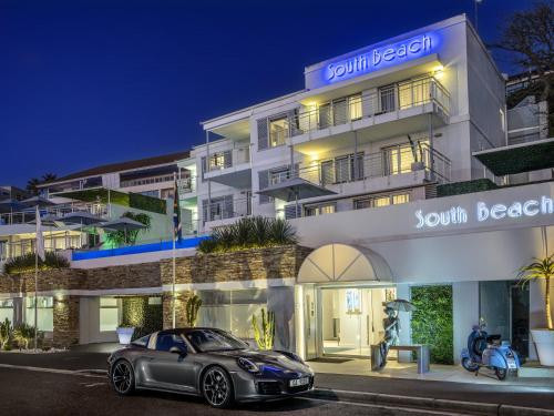 a car parked in front of a building at South Beach Camps Bay Boutique Hotel in Cape Town