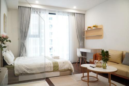 Ένα ή περισσότερα κρεβάτια σε δωμάτιο στο Vinhome Smart CiTy toà D