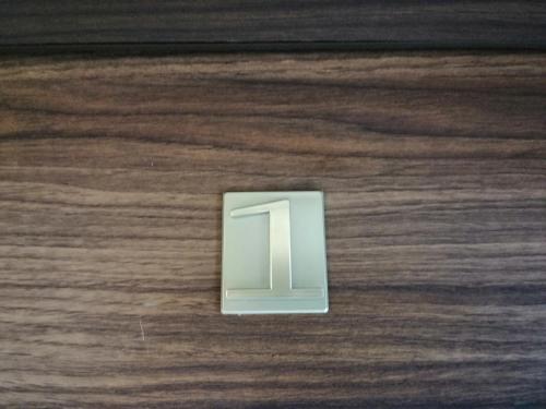 a light switch on a wooden table at Agroturystyka Szklana Polana in Huta Szklana