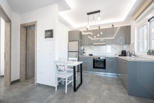 Kuchyň nebo kuchyňský kout v ubytování Velvet Apartments