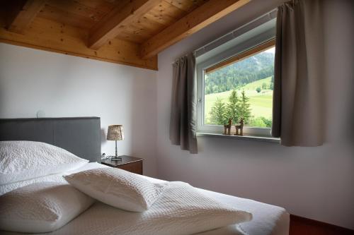 Postel nebo postele na pokoji v ubytování Ferienhaus Kapeller