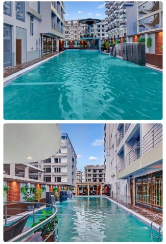 a large swimming pool in the middle of a building at The Pikus Paradise in Digha