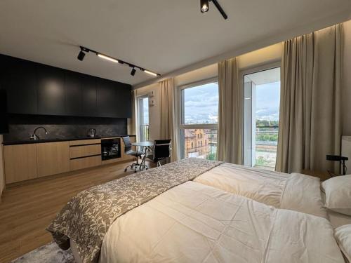 En eller flere senge i et værelse på BnP Luxury Old Town 24h check-in, Business and Pleasure