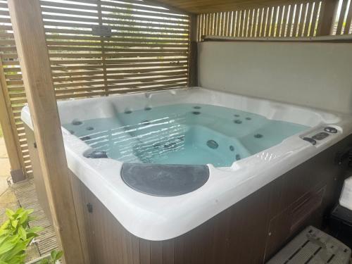a large bath tub in a room at Little Nauvoo, Near Bath in Radstock