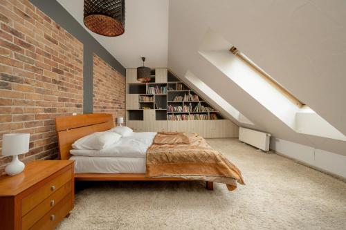 Posteľ alebo postele v izbe v ubytovaní Jasny Dwupoziomowy Apartament we Wrocławiu by Noclegi Renters