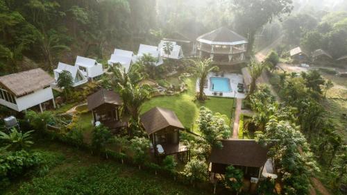 an aerial view of a house on a hill at Voasis Valley Krabi - Natural Resort - Adults Only in Ban Nong Kok (1)
