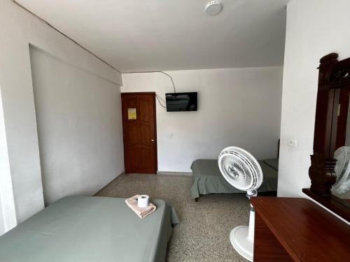 TV a/nebo společenská místnost v ubytování Hotel el Recuerdo