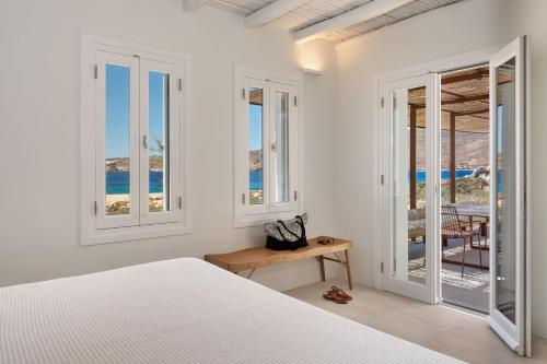 Кровать или кровати в номере Ammoa Beach Residences