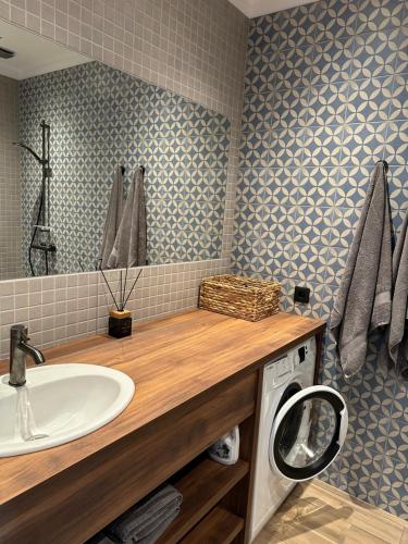Koupelna v ubytování LUČI jūras apartamenti