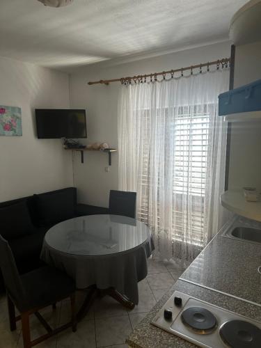 Μια τηλεόραση ή/και κέντρο ψυχαγωγίας στο Apartments Sevo
