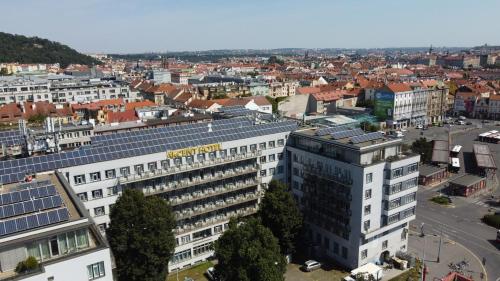 an aerial view of a city with buildings at Akcent hotel in Prague