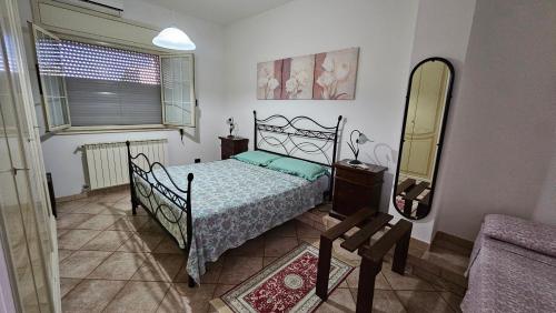 Postel nebo postele na pokoji v ubytování case vacanze, La casa di Angelo, con terrazzo