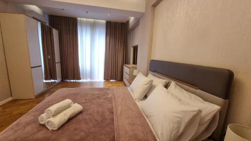 Katil atau katil-katil dalam bilik di Azure Premium by Bakuapart