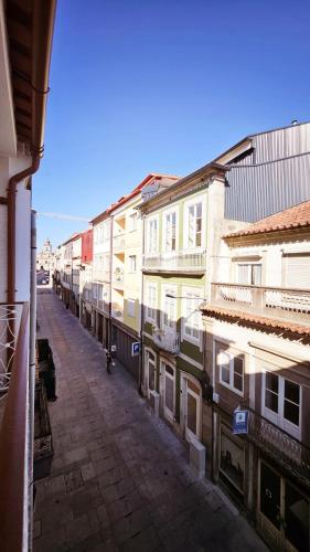 a view of a city street with buildings at Rooms4you 1 in historic center of Braga in Braga
