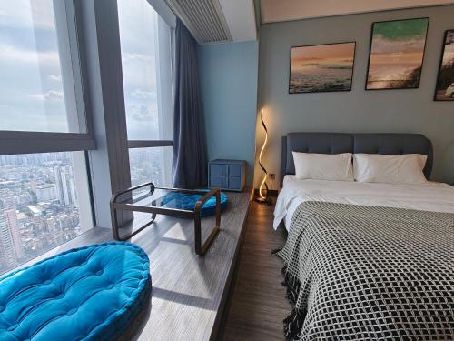 Postel nebo postele na pokoji v ubytování STAR STAGE International Apartment Hotel - 1min to Line2 & Line8 ChangGang STN-Free private car delivery to Canton Fair from Otc 15th to Nov 4th