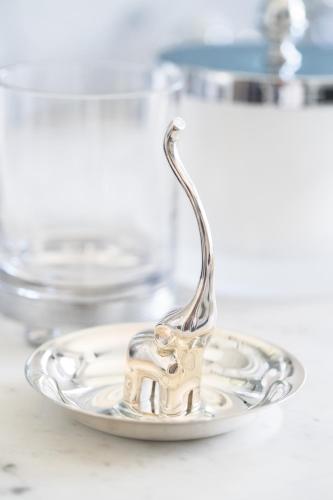 a silver plate with a elephant on it at La Réserve Paris Hotel & Spa in Paris