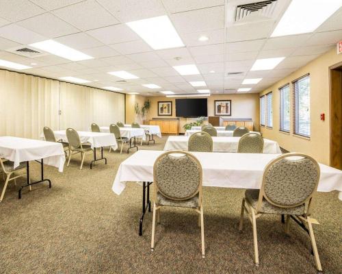 a conference room with white tables and chairs at Quality Inn Homestead Park in Billings