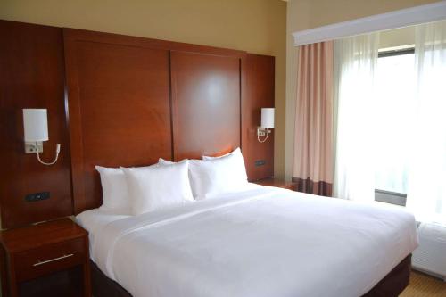 a large white bed in a hotel room at Comfort Suites Lancaster Amish Country in Lancaster