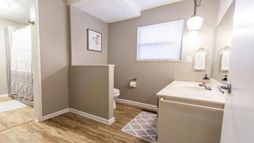 a bathroom with a sink and a toilet at Knoxville country living in Knoxville