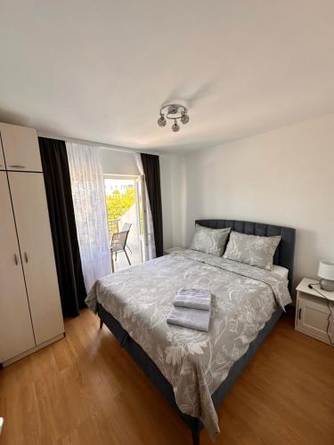 Postel nebo postele na pokoji v ubytování Helena apartment
