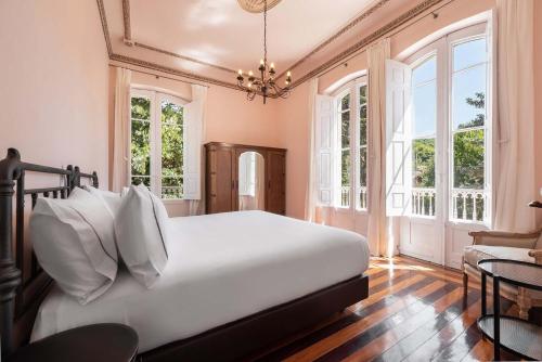 Ένα ή περισσότερα κρεβάτια σε δωμάτιο στο Casa Palacio de Esgos