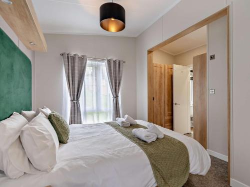 Ένα ή περισσότερα κρεβάτια σε δωμάτιο στο 2 Bed in Newport 94717