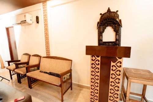 a group of chairs and a podium in a room at Sinon Baga Retreat in Baga