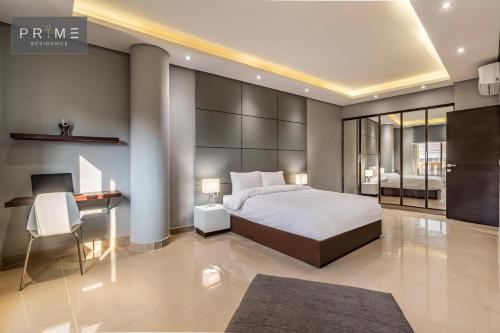 Prime Residence New Cairoにあるベッド