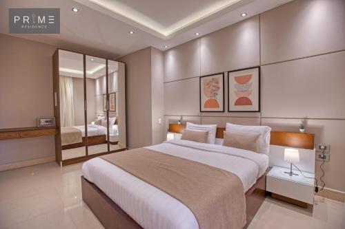Prime Residence New Cairoにあるベッド