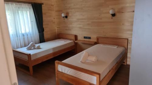 Postel nebo postele na pokoji v ubytování Cirali Simge Holiday Houses