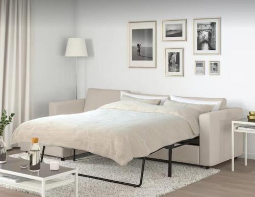 En eller flere senge i et værelse på Central luxurious apartment