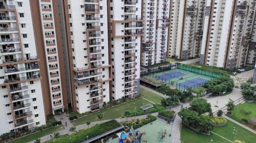 an aerial view of a city with tall buildings at Serene Sanctuary in Hyderabad