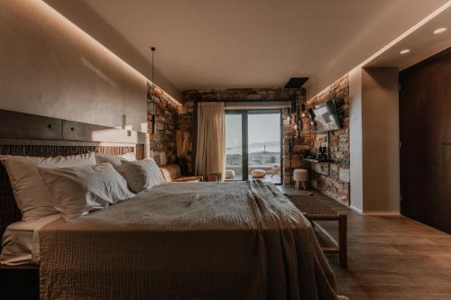 Postel nebo postele na pokoji v ubytování ONYM Curated Villas