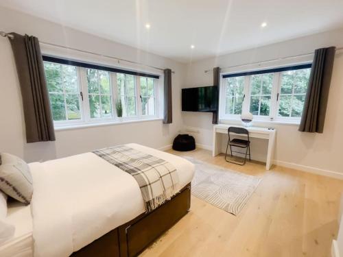 En eller flere senge i et værelse på The Gatehouse