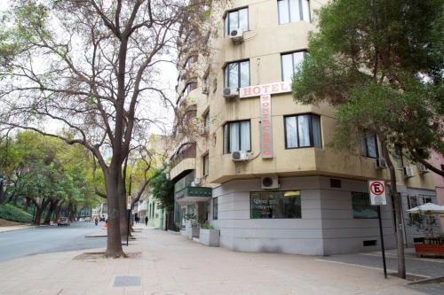 a building on the side of a street at Hotel Montecarlo Santiago in Santiago
