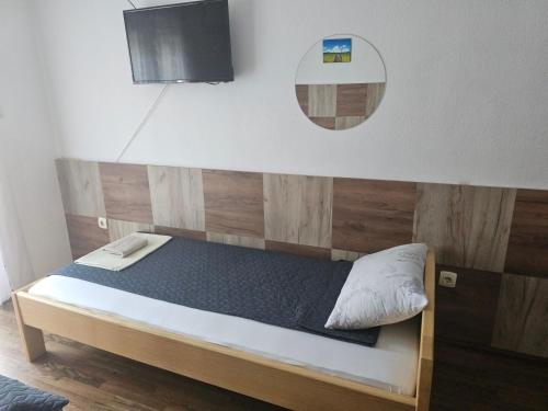 Cama o camas de una habitación en Restoran i sobe "Tocak"