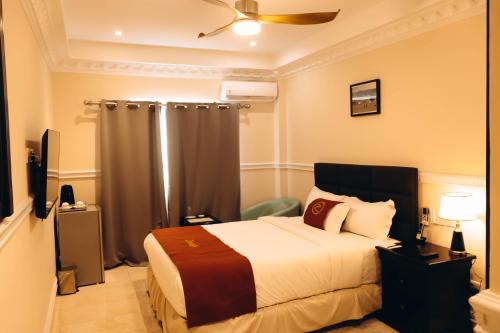 Katil atau katil-katil dalam bilik di Zimansky Hotel